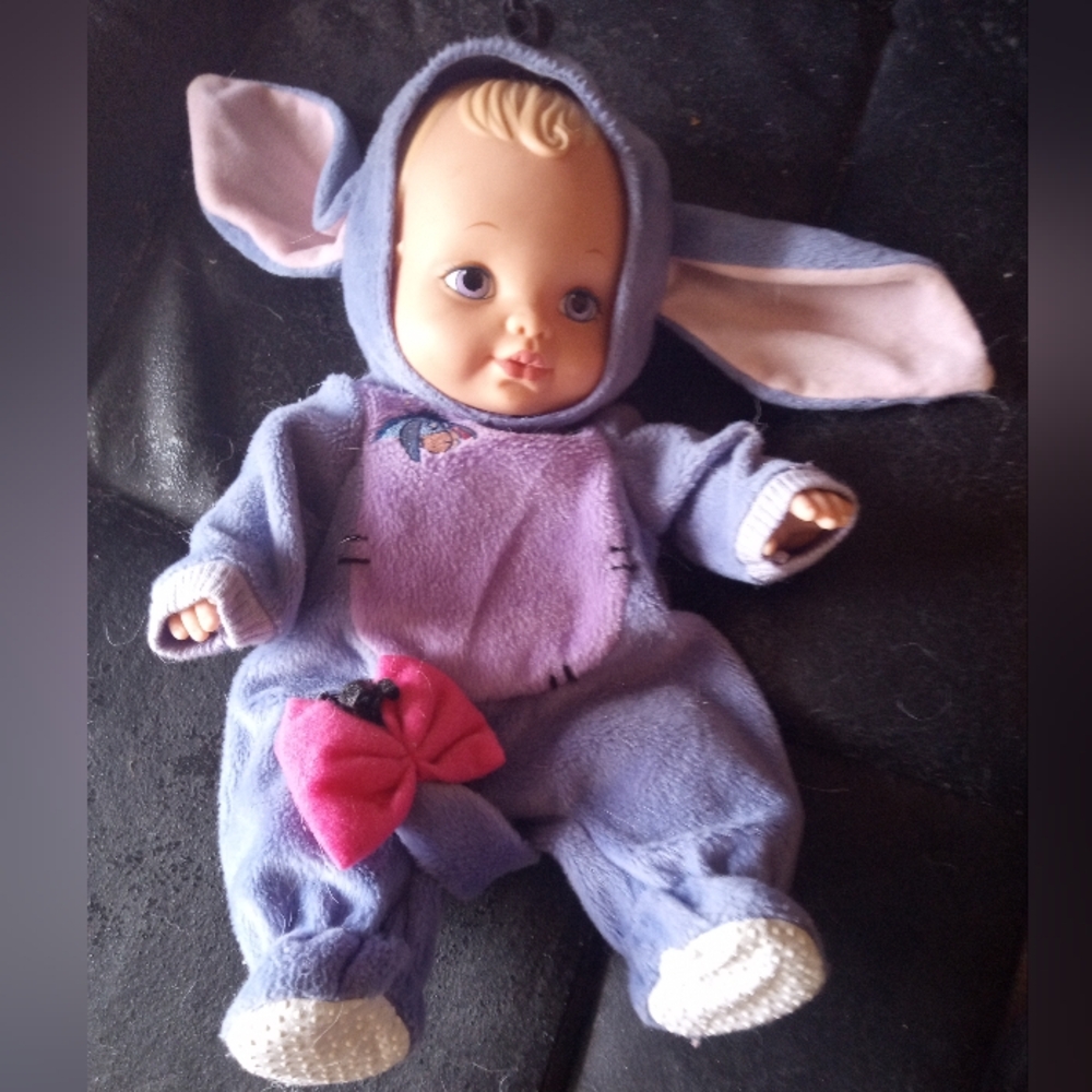 Baby doll dressed in a Disney Eeyore costume water baby